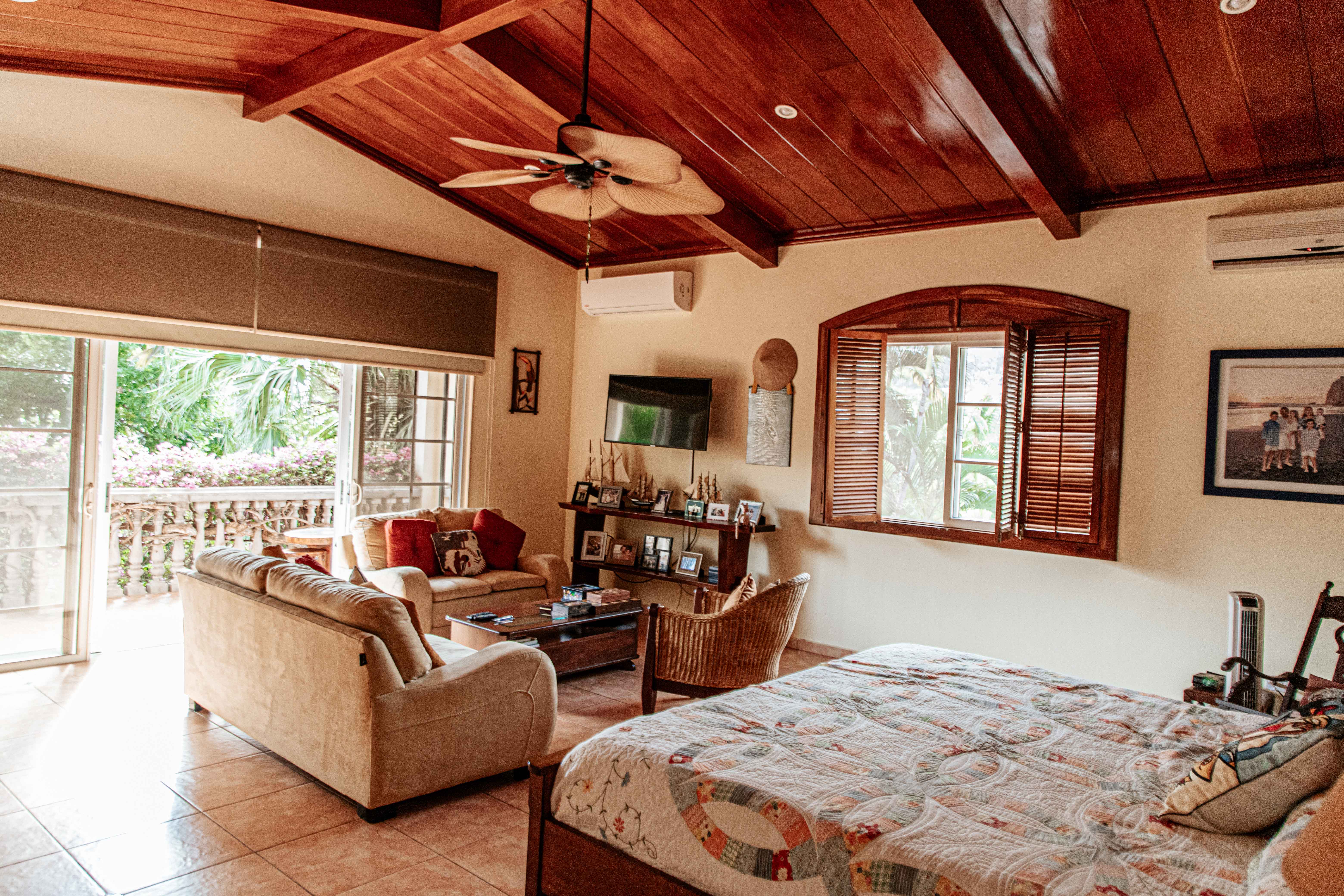 Master bedroom with mahogany ceilings
